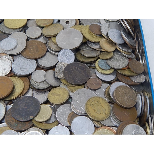 206 - Large tin of World coinage totally unsorted weighing 6.9 kilos gross