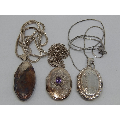 372 - Three Large Silver Lockets on Chains.