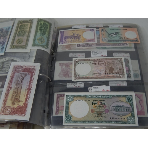 82 - A large collection of World Banknotes housed in folder, many good countries and ranges included Iraq... 