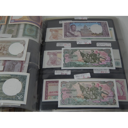 82 - A large collection of World Banknotes housed in folder, many good countries and ranges included Iraq... 