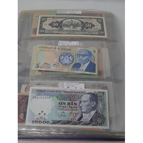 82 - A large collection of World Banknotes housed in folder, many good countries and ranges included Iraq... 