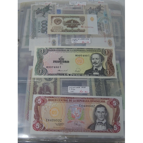 82 - A large collection of World Banknotes housed in folder, many good countries and ranges included Iraq... 