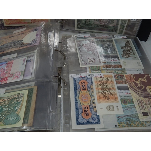 93 - Large Collection of World Banknotes housed in 2 x folders many interesting Countries noted, mixed co... 