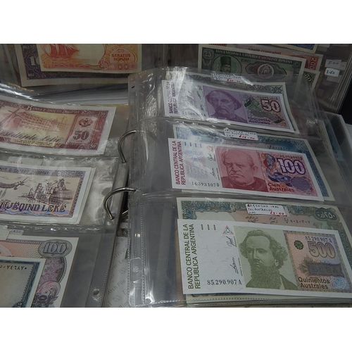 93 - Large Collection of World Banknotes housed in 2 x folders many interesting Countries noted, mixed co... 