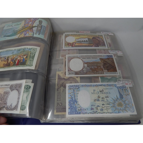 105 - A large collection of Banknotes of the World including Hong Kong, Iceland, Bosnia, Greece, Guinee, G... 