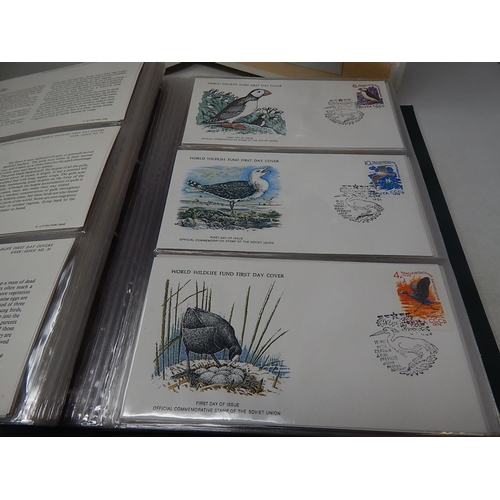 121 - The Official Collection of World Wildlife First Day Covers in green collectors folder twinned with T... 