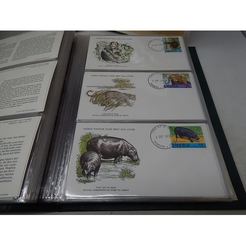 121 - The Official Collection of World Wildlife First Day Covers in green collectors folder twinned with T... 