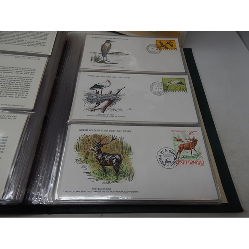 121 - The Official Collection of World Wildlife First Day Covers in green collectors folder twinned with T... 