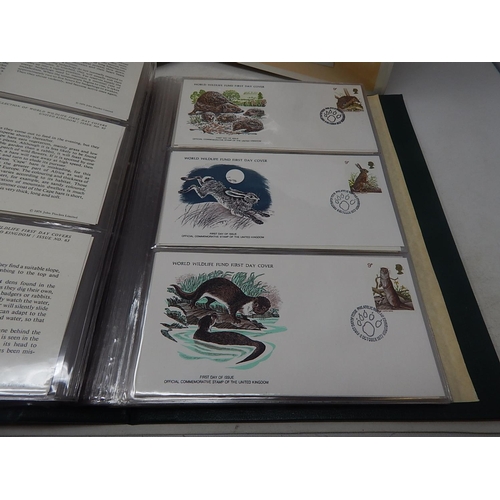 121 - The Official Collection of World Wildlife First Day Covers in green collectors folder twinned with T... 