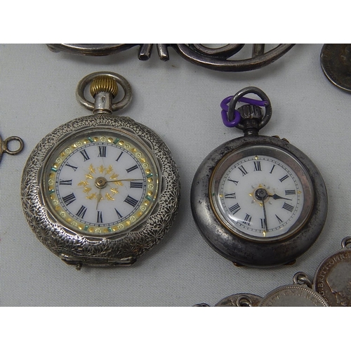 142 - A hallmarked Silver Nurses Two Piece Buckle; 2 x Silver Threepence bracelets; a Silver Threepence br... 