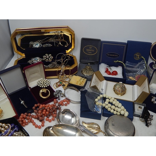 150 - A large box containing a selection of costume jewellery, music boxes, etc