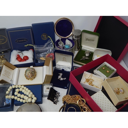 150 - A large box containing a selection of costume jewellery, music boxes, etc