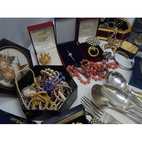 150 - A large box containing a selection of costume jewellery, music boxes, etc