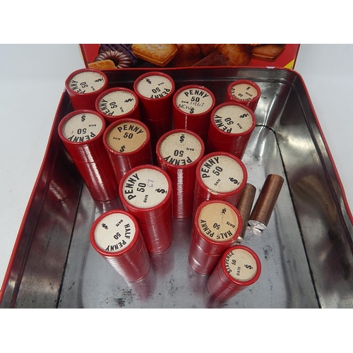 180 - A vintage biscuit tin containing a large selection of coinage all housed in vintage Red Sandhill Tub... 