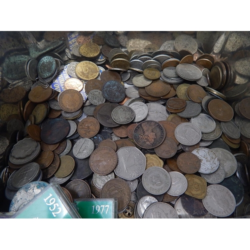 181 - Accumulation of GB and World coinage in a vintage biscuit tin