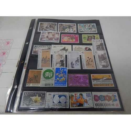 196 - A small collection of Hong Kong Stamps Used on Hagner sheet twinned with a quantity of Mint Hong Kon... 