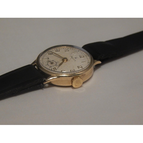 363D - ROLEX: Ladies 9ct Gold Manual Wind Wristwatch with Rolex Crown on Leather Strap: Working when catalo... 