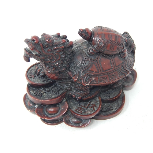 176 - Small Oriental Style Dragon carrying a Turtle