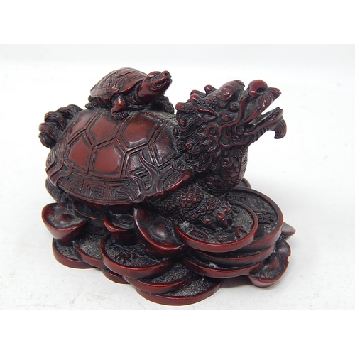 176 - Small Oriental Style Dragon carrying a Turtle