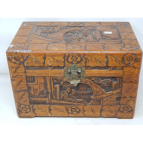 460 - Oriental Carved box, with a matching box housed within.