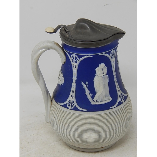 676 - Jug with pivoted working lid