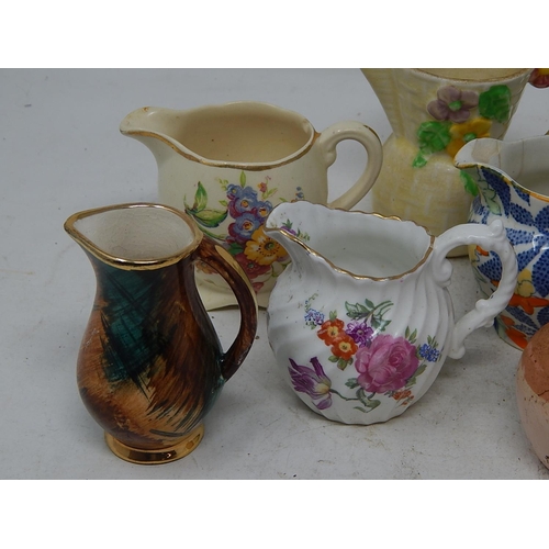 755 - Selection of miniature jugs