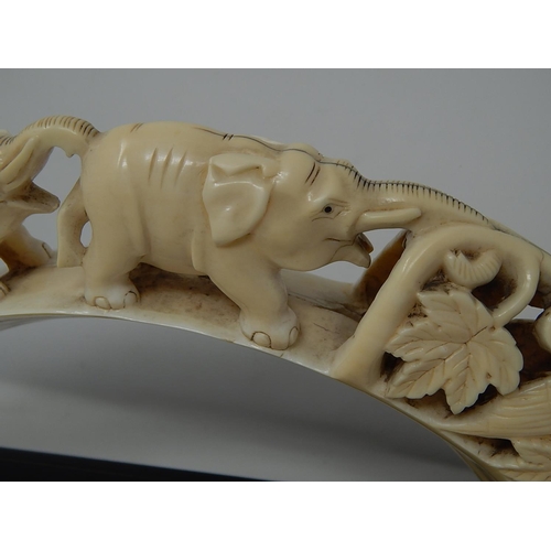 308 - Late Victorian Ivory Elephant Tusk (Bridge of Elephants) on its original wooden stand. Tusk Measures... 