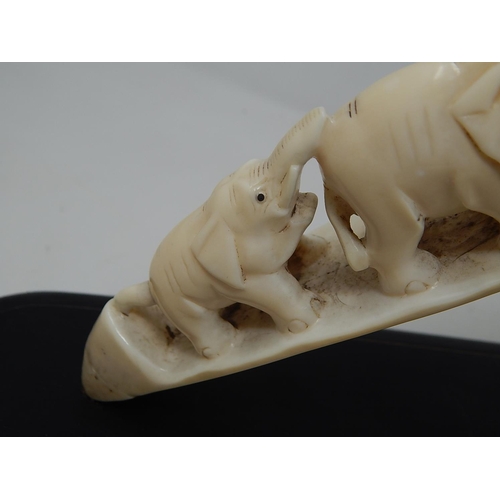 308 - Late Victorian Ivory Elephant Tusk (Bridge of Elephants) on its original wooden stand. Tusk Measures... 