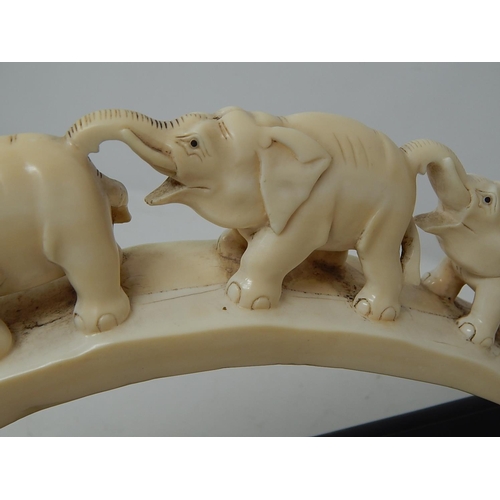 308 - Late Victorian Ivory Elephant Tusk (Bridge of Elephants) on its original wooden stand. Tusk Measures... 