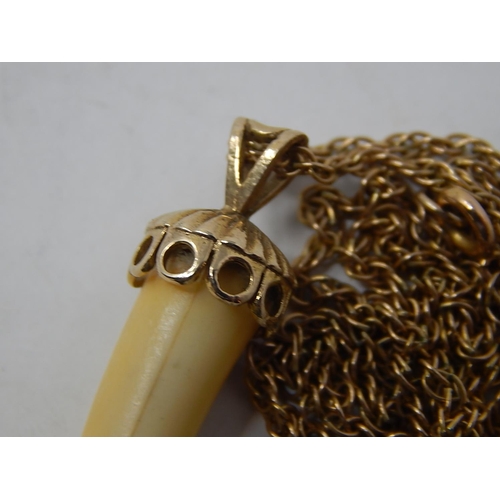 236 - 9ct Gold Mounted Tusk Pendant on 9ct Gold Chain