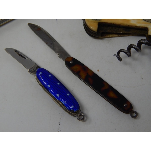 287 - Four Penknives Including a Miniature Enamelled Example: A Miniature Tortoiseshell Hafted Example etc