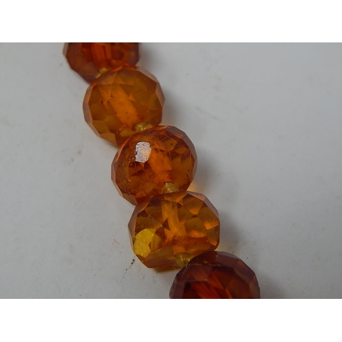 294 - 1920's Amber Coloured Necklace: Length 42cm: Weight 24g