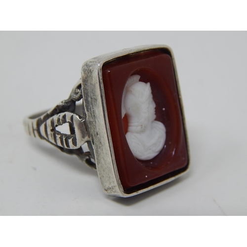 224 - Two silver rings, marked, one amethyst intaglio and one cameo. Roman warrior
designs.