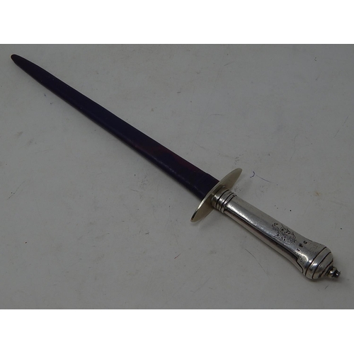 226 - Antique Silver handled stiletto dagger with purple leather sheath. Armorial coat of arms
engraved on... 