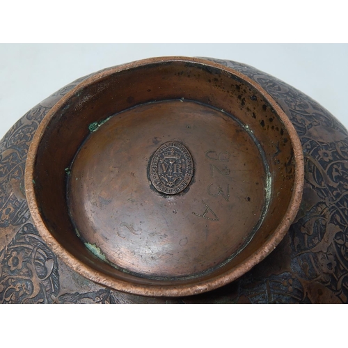 323 - Copper Persian style bowl with two bands of Islamic strip.
Elkington Department of Science & Art
Lab... 