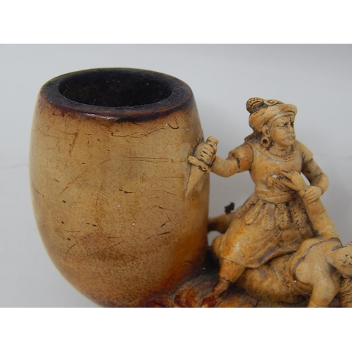 328 - Meerschaum Pipe depicting Moor attacking a Christian woman.
Amber mouthpiece
L120mm