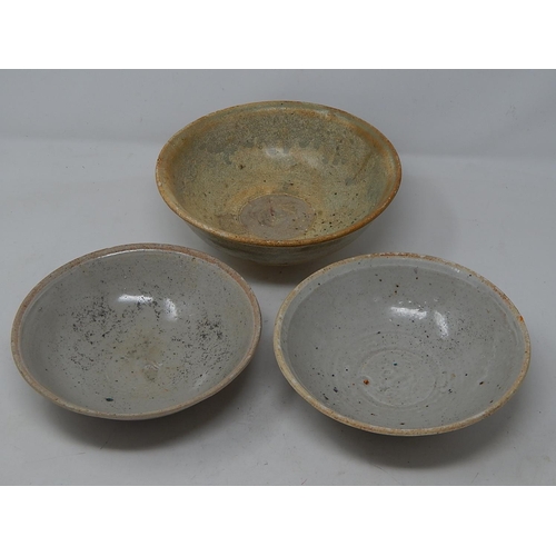 335 - Three early celadon glazed bowls.
Two at diameter 150mm & one at 165mm.