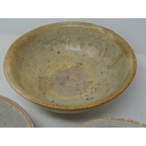 335 - Three early celadon glazed bowls.
Two at diameter 150mm & one at 165mm.