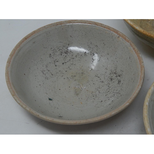 335 - Three early celadon glazed bowls.
Two at diameter 150mm & one at 165mm.