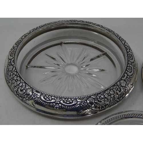 187 - Three sterling silver mounted crystal wine coasters