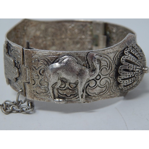 128 - Continental Silver Bracelet together with a large pair of silver earrings: gross weight 75.2g