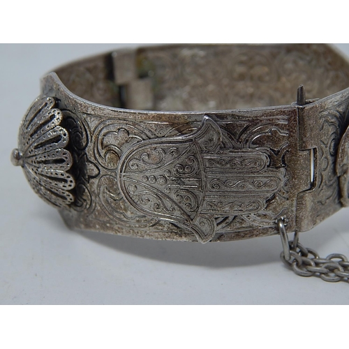 128 - Continental Silver Bracelet together with a large pair of silver earrings: gross weight 75.2g