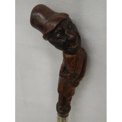 332 - Folk art walking cane. Carved figure on handle and hallmarked silver collar 1928.
L88cm