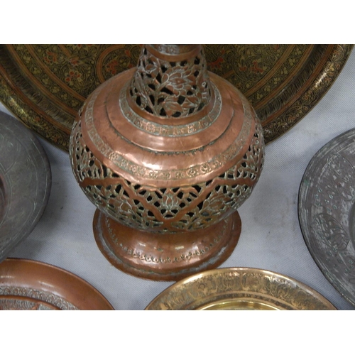 340 - Seventeen brass and tinned copper Indo-Persian dishes and bowls and an
incense burner H 67cm