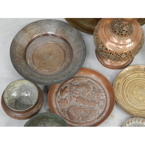 340 - Seventeen brass and tinned copper Indo-Persian dishes and bowls and an
incense burner H 67cm