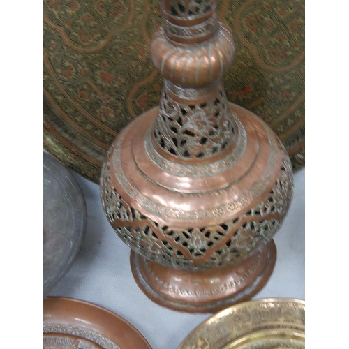 340 - Seventeen brass and tinned copper Indo-Persian dishes and bowls and an
incense burner H 67cm