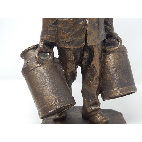 356 - Neolith Sculpture of a Farmer with milk churns: Height 30cm