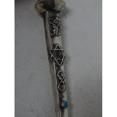 212O - Silver Torah Pointer with a Figural Finial: Set with a Turquoise Cabochon: Measuring 17cm: Marked 18... 