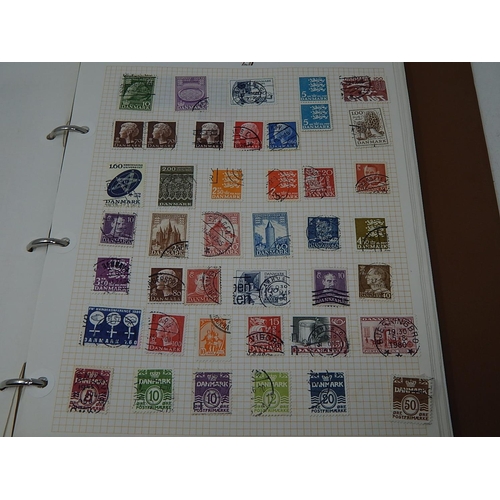 382 - Album containing a large number of UK & Worldwide stamps