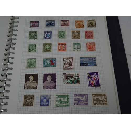 384 - Album containing a large number of & Worldwide stamps